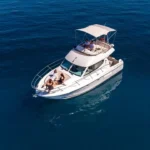 Aerial view of guests relaxing on the Jeanneau Prestige 32 during a private boat tour near Split