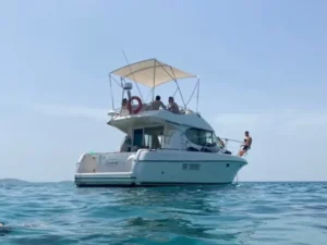 Jeanneau Prestige 32 anchored at sea with guests onboard during a private boat tour near Split