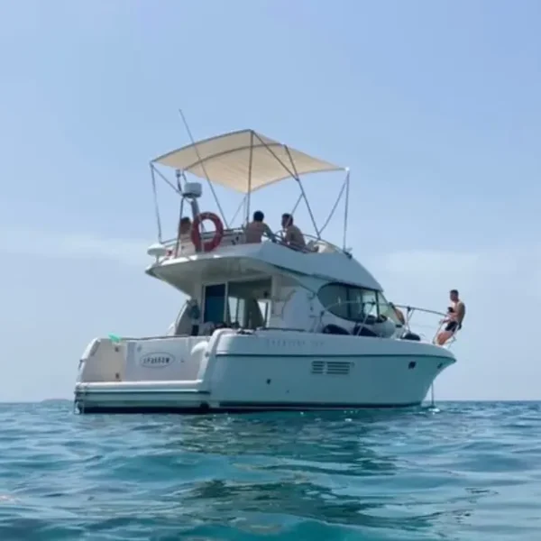 Jeanneau Prestige 32 anchored at sea with guests onboard during a private boat tour near Split