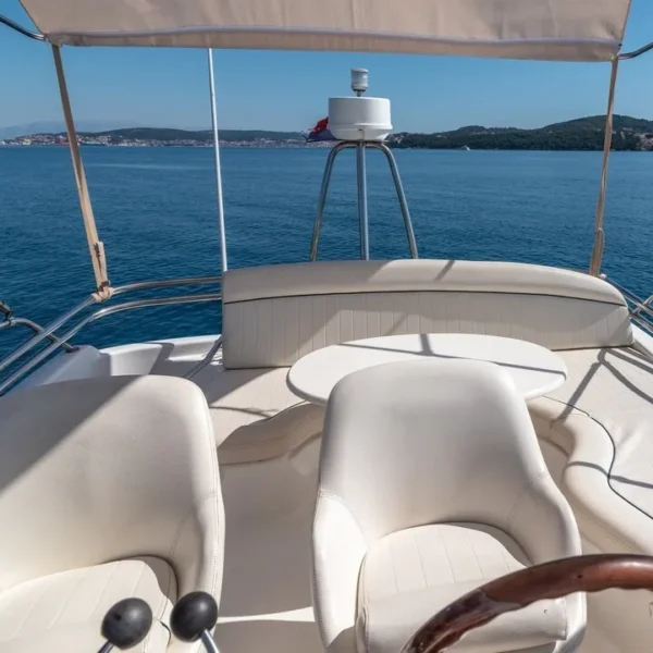 View from Jeanneau Prestinge 32 flybridge on open sea.