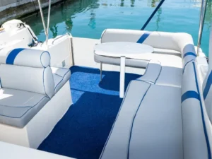 Cockpit seating area with table on the Saver Riviera 24 motor boat