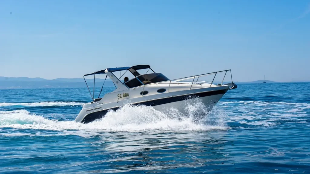 Saver Riviera 24 motor boat cruising at sea during a private boat tour from Split